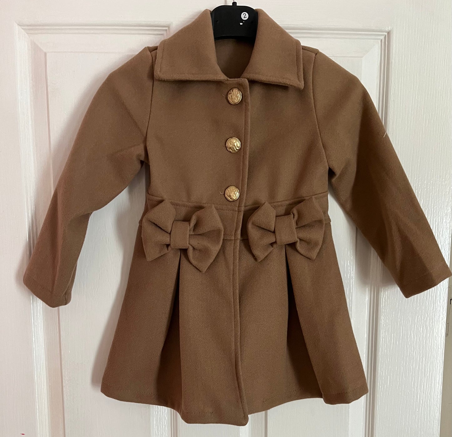 Spanish style bow coats